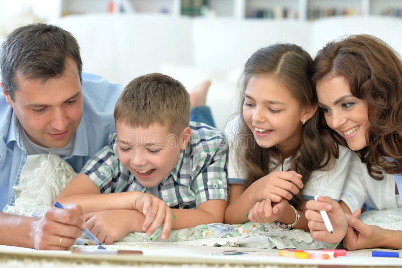 Happy family doing science experiment together